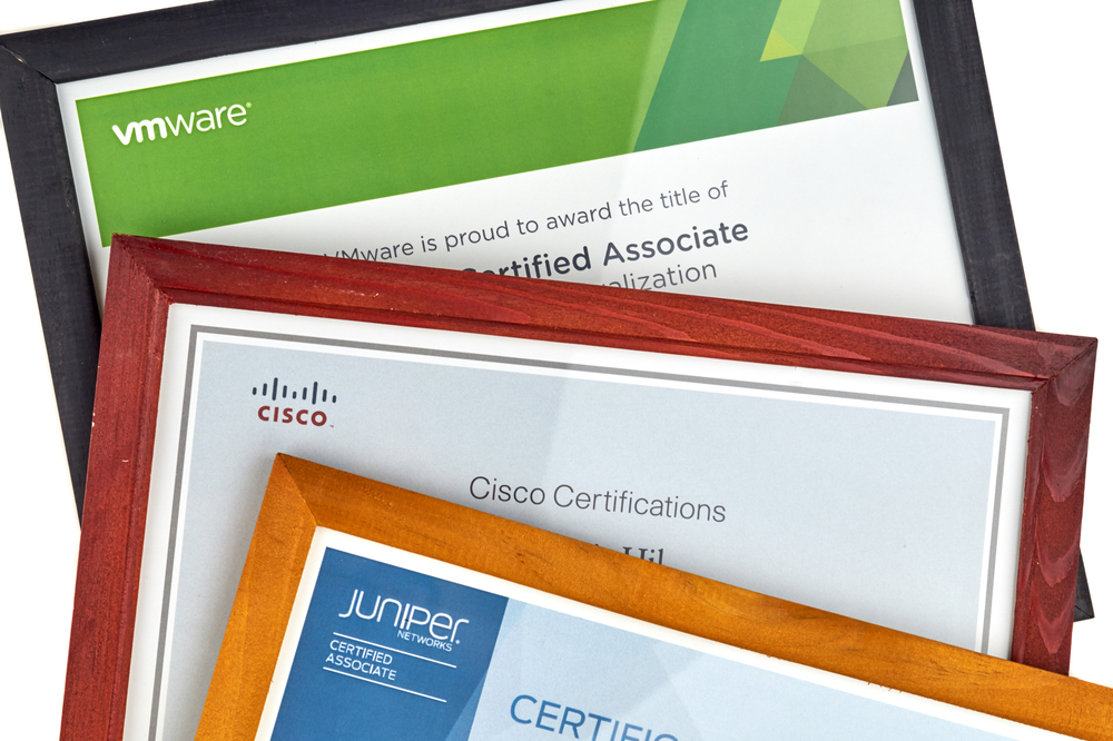 Picture of Cisco certifications on plaques